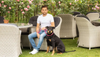 Adem Fehmi sitting with a dog
